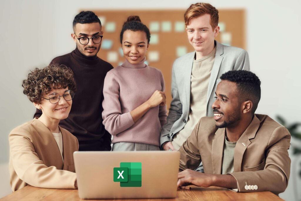 Consultants using Excel to automate data reports and streamline business tasks on a laptop